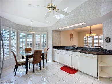 Spectacular north-facing views of a large LAKE and the GOLF on Herons Glen Golf and Country Club in Florida - for sale on GolfHomes.com, golf home, golf lot