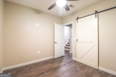 This beautifully remodeled 4 bed, 2 bath home in the Turtle Cove on Turtle Cove Golf Course in Georgia - for sale on GolfHomes.com, golf home, golf lot