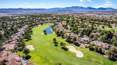 Elegant single-story home in the prestigious guard-gated Spanish on Spanish Trail Golf and Country Club in Nevada - for sale on GolfHomes.com, golf home, golf lot