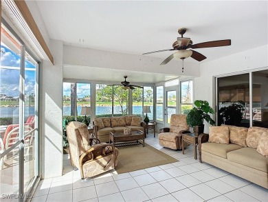 Spectacular north-facing views of a large LAKE and the GOLF on Herons Glen Golf and Country Club in Florida - for sale on GolfHomes.com, golf home, golf lot