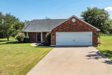 Located just a few blocks from a scenic 9-hole golf course, this on Star Harbor Golf Club in Texas - for sale on GolfHomes.com, golf home, golf lot