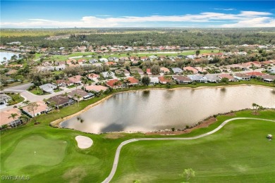 Spectacular north-facing views of a large LAKE and the GOLF on Herons Glen Golf and Country Club in Florida - for sale on GolfHomes.com, golf home, golf lot
