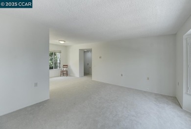 Delightful Del Monte Rossmoor Model! An upper unit with carport on Rossmoor Golf Course in California - for sale on GolfHomes.com, golf home, golf lot
