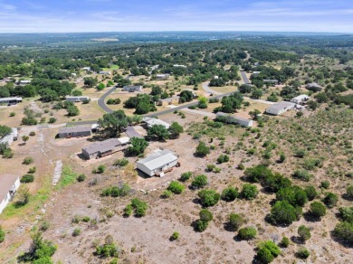 Embrace the serene Hill Country lifestyle with this exceptional on Slick Rock Golf Course - Horseshoe Bay in Texas - for sale on GolfHomes.com, golf home, golf lot
