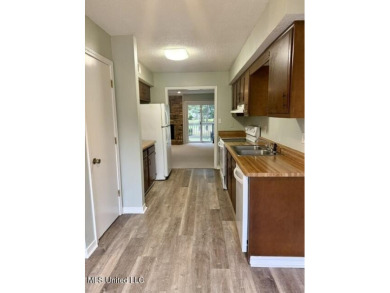 End Unit Townhome on the Golf CourseEnjoy golf course living in on Diamondhead Country Club in Mississippi - for sale on GolfHomes.com, golf home, golf lot