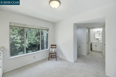 Delightful Del Monte Rossmoor Model! An upper unit with carport on Rossmoor Golf Course in California - for sale on GolfHomes.com, golf home, golf lot