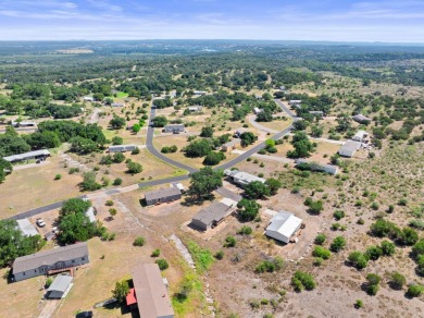 Embrace the serene Hill Country lifestyle with this exceptional on Slick Rock Golf Course - Horseshoe Bay in Texas - for sale on GolfHomes.com, golf home, golf lot