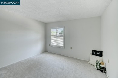 Delightful Del Monte Rossmoor Model! An upper unit with carport on Rossmoor Golf Course in California - for sale on GolfHomes.com, golf home, golf lot