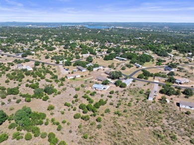 Embrace the serene Hill Country lifestyle with this exceptional on Slick Rock Golf Course - Horseshoe Bay in Texas - for sale on GolfHomes.com, golf home, golf lot