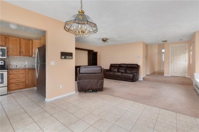 This fantastic, duplex-style townhome is located in the on Louisquisset Golf Club in Rhode Island - for sale on GolfHomes.com, golf home, golf lot