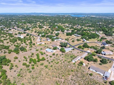 Embrace the serene Hill Country lifestyle with this exceptional on Slick Rock Golf Course - Horseshoe Bay in Texas - for sale on GolfHomes.com, golf home, golf lot