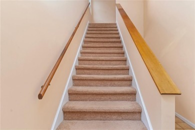 This fantastic, duplex-style townhome is located in the on Louisquisset Golf Club in Rhode Island - for sale on GolfHomes.com, golf home, golf lot