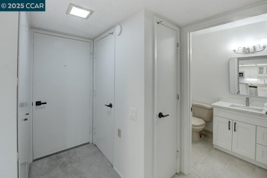 Delightful Del Monte Rossmoor Model! An upper unit with carport on Rossmoor Golf Course in California - for sale on GolfHomes.com, golf home, golf lot