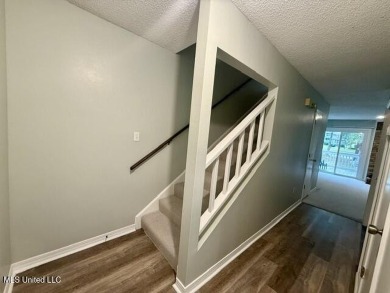 End Unit Townhome on the Golf CourseEnjoy golf course living in on Diamondhead Country Club in Mississippi - for sale on GolfHomes.com, golf home, golf lot