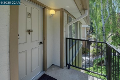 Delightful Del Monte Rossmoor Model! An upper unit with carport on Rossmoor Golf Course in California - for sale on GolfHomes.com, golf home, golf lot