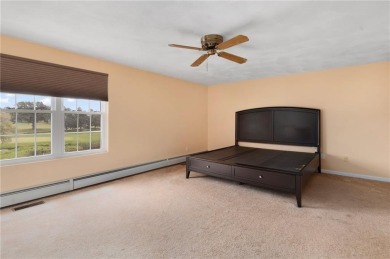 This fantastic, duplex-style townhome is located in the on Louisquisset Golf Club in Rhode Island - for sale on GolfHomes.com, golf home, golf lot