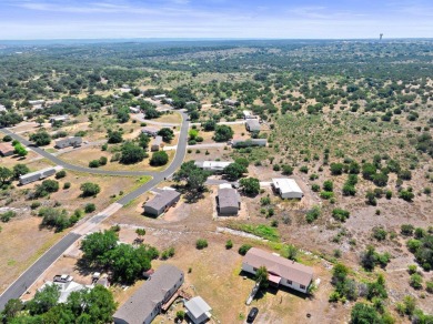 Embrace the serene Hill Country lifestyle with this exceptional on Slick Rock Golf Course - Horseshoe Bay in Texas - for sale on GolfHomes.com, golf home, golf lot