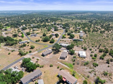Embrace the serene Hill Country lifestyle with this exceptional on Slick Rock Golf Course - Horseshoe Bay in Texas - for sale on GolfHomes.com, golf home, golf lot