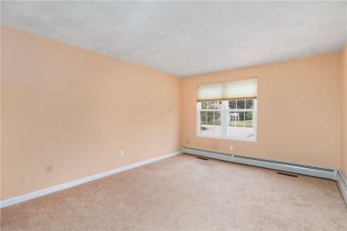 This fantastic, duplex-style townhome is located in the on Louisquisset Golf Club in Rhode Island - for sale on GolfHomes.com, golf home, golf lot