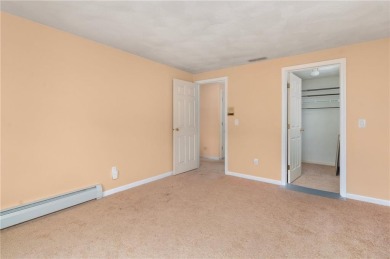 This fantastic, duplex-style townhome is located in the on Louisquisset Golf Club in Rhode Island - for sale on GolfHomes.com, golf home, golf lot
