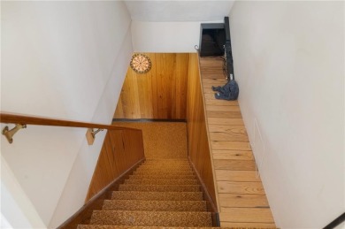 This fantastic, duplex-style townhome is located in the on Louisquisset Golf Club in Rhode Island - for sale on GolfHomes.com, golf home, golf lot