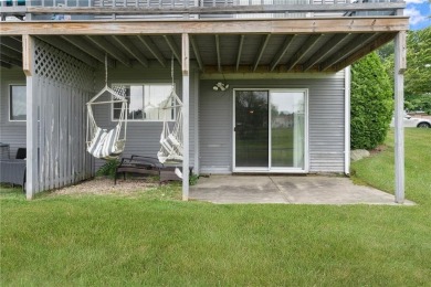 This fantastic, duplex-style townhome is located in the on Louisquisset Golf Club in Rhode Island - for sale on GolfHomes.com, golf home, golf lot