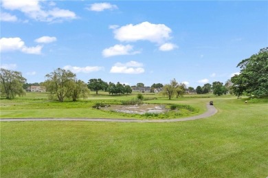 This fantastic, duplex-style townhome is located in the on Louisquisset Golf Club in Rhode Island - for sale on GolfHomes.com, golf home, golf lot