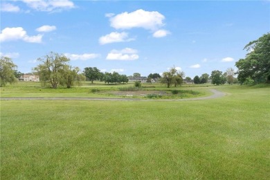 This fantastic, duplex-style townhome is located in the on Louisquisset Golf Club in Rhode Island - for sale on GolfHomes.com, golf home, golf lot