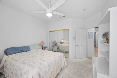 Belmont model with plantation shutters throughout the house on Highland Falls Golf Club in Nevada - for sale on GolfHomes.com, golf home, golf lot