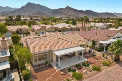 Belmont model with plantation shutters throughout the house on Highland Falls Golf Club in Nevada - for sale on GolfHomes.com, golf home, golf lot