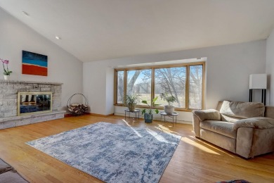 This updated mid-century raised ranch offers the tranquility of on Odana Hills Golf Course in Wisconsin - for sale on GolfHomes.com, golf home, golf lot