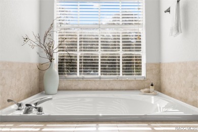 This spacious and inviting three-bedroom, plus den, two-bath on Sugarmill Woods Golf and Country Club in Florida - for sale on GolfHomes.com, golf home, golf lot