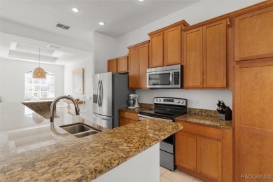This spacious and inviting three-bedroom, plus den, two-bath on Sugarmill Woods Golf and Country Club in Florida - for sale on GolfHomes.com, golf home, golf lot