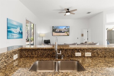 This spacious and inviting three-bedroom, plus den, two-bath on Sugarmill Woods Golf and Country Club in Florida - for sale on GolfHomes.com, golf home, golf lot