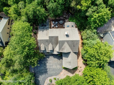 Spectacularly maintained 3-bedroom, 3-bath home located in the on Pinecrest Lake Golf and Country Club in Pennsylvania - for sale on GolfHomes.com, golf home, golf lot