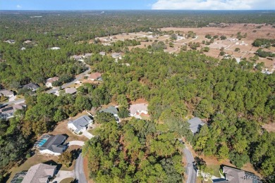 This spacious and inviting three-bedroom, plus den, two-bath on Sugarmill Woods Golf and Country Club in Florida - for sale on GolfHomes.com, golf home, golf lot