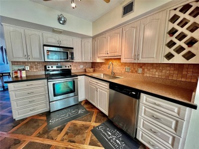 Move into this 2 bed/2 bath, turnkey-furnished condo, located on On Top Of The World Golf Course in Florida - for sale on GolfHomes.com, golf home, golf lot