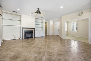 Serenity awaits in this inviting Madeira model, perfectly on Eagle Ridge At Spruce Creek Country Club in Florida - for sale on GolfHomes.com, golf home, golf lot