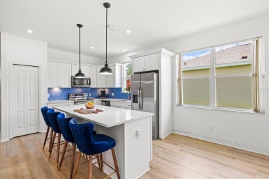 Simply spectacular... you will love this spacious, light, bright on University Park Country Club in Florida - for sale on GolfHomes.com, golf home, golf lot