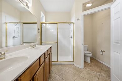 Serenity awaits in this inviting Madeira model, perfectly on Eagle Ridge At Spruce Creek Country Club in Florida - for sale on GolfHomes.com, golf home, golf lot