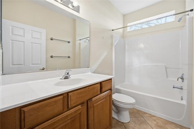 Serenity awaits in this inviting Madeira model, perfectly on Eagle Ridge At Spruce Creek Country Club in Florida - for sale on GolfHomes.com, golf home, golf lot