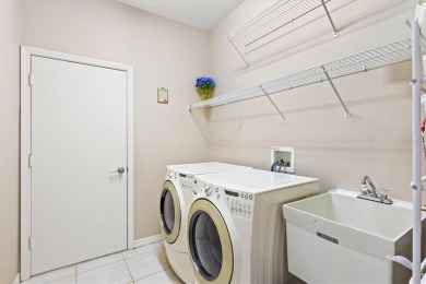 Simply spectacular... you will love this spacious, light, bright on University Park Country Club in Florida - for sale on GolfHomes.com, golf home, golf lot