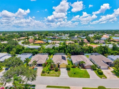 Simply spectacular... you will love this spacious, light, bright on University Park Country Club in Florida - for sale on GolfHomes.com, golf home, golf lot