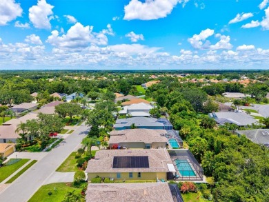 Simply spectacular... you will love this spacious, light, bright on University Park Country Club in Florida - for sale on GolfHomes.com, golf home, golf lot