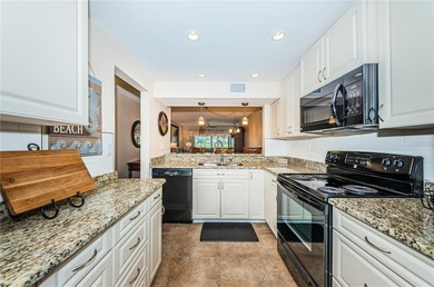 Paradise doesn't just await you here -- it welcomes you the on Isla Del Sol Yacht and Country Club in Florida - for sale on GolfHomes.com, golf home, golf lot