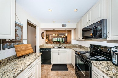 Paradise doesn't just await you here -- it welcomes you the on Isla Del Sol Yacht and Country Club in Florida - for sale on GolfHomes.com, golf home, golf lot