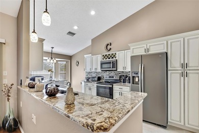 Villa in Timber Pines 55+ Community. Beautifully updated on Timber Pines Golf Course in Florida - for sale on GolfHomes.com, golf home, golf lot