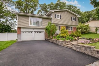 Meticulously maintained split-level home in Elmsford with major on Elmwood Country Club in New York - for sale on GolfHomes.com, golf home, golf lot