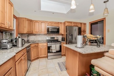 Meticulously maintained split-level home in Elmsford with major on Elmwood Country Club in New York - for sale on GolfHomes.com, golf home, golf lot