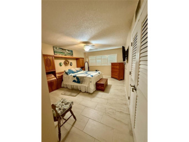 This GROUND FLOOR condo is a true gem with 1,400 sq ft of living on On Top Of The World Golf Course in Florida - for sale on GolfHomes.com, golf home, golf lot